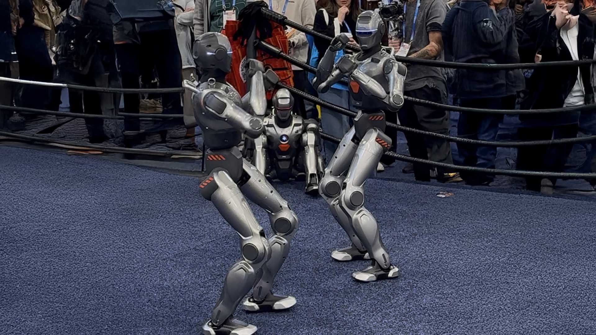 Humanoid robot performing precision tasks with visible limitations in speed and accuracy